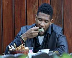 Usher eating vegetarian food Usher eating vegetarian food